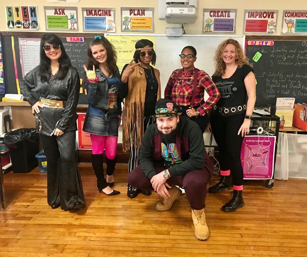 Teachers dress their decade on Halloween at DLEACS!